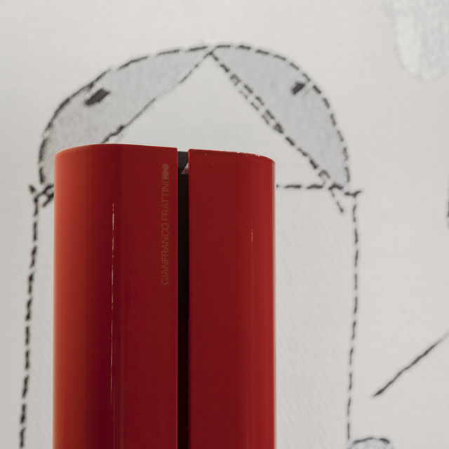 Detail of the red Megaron engraved with the exhibition logo for Frattini’s centenary.