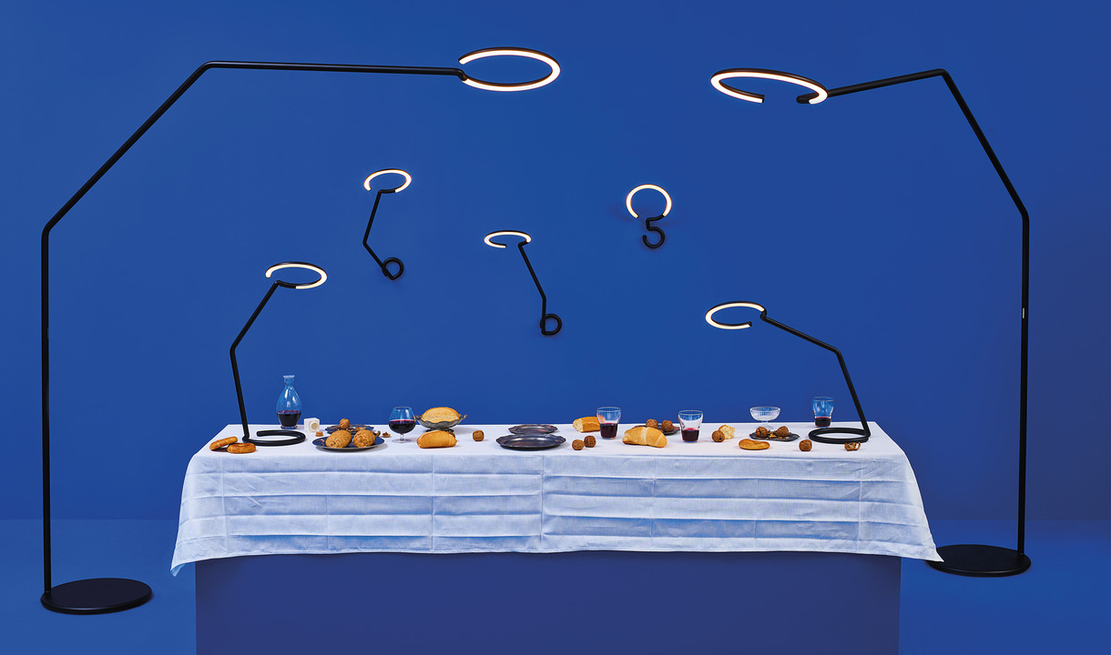 Immagine della famiglia di lampade Vine Light: parete, tavolo e terra.