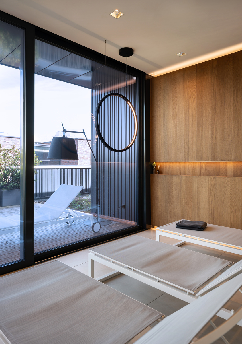 Image of the spa with a suspended 'O' illuminating the room.