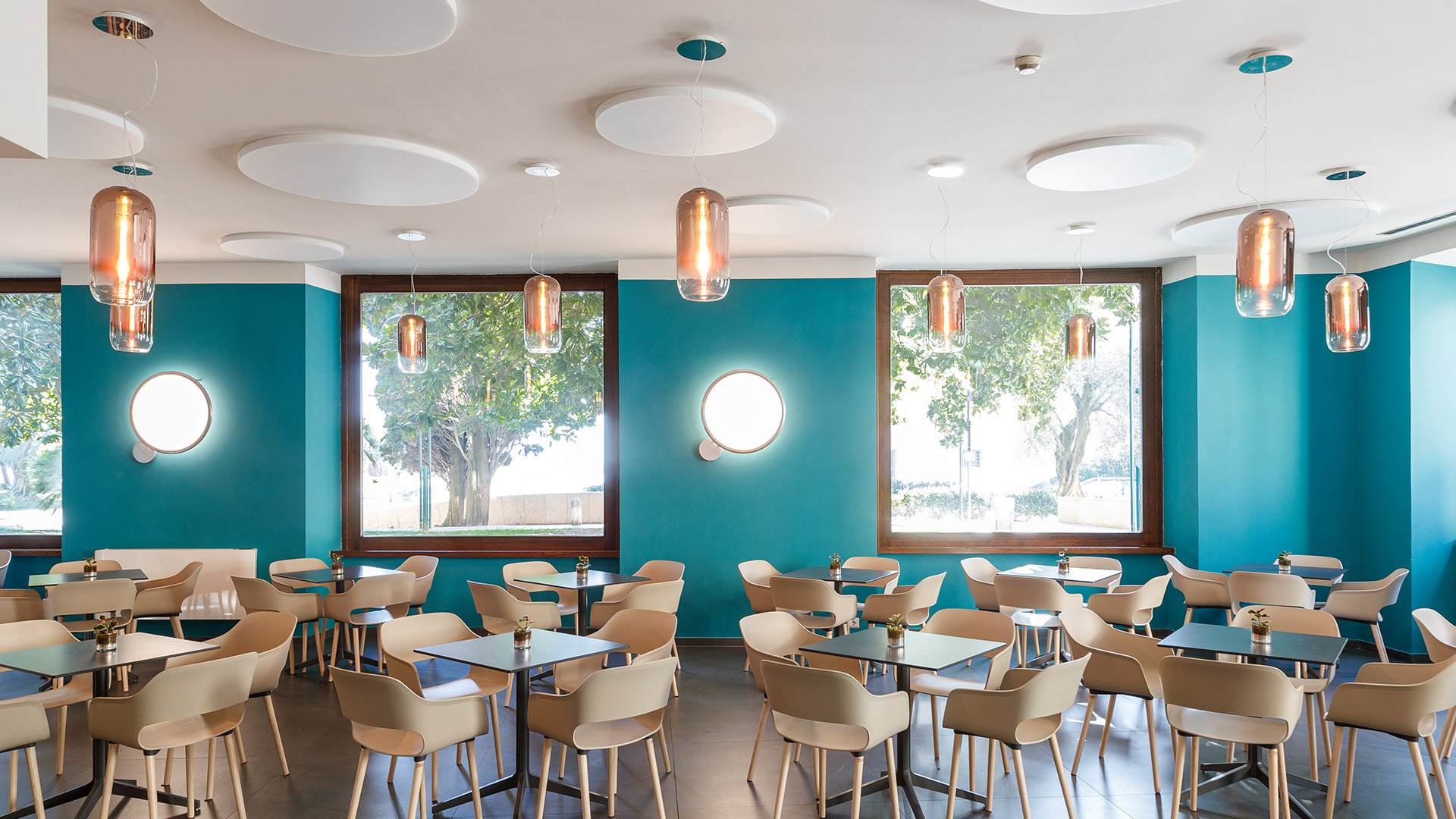 Artemide Gople Lamps Copper in restaurant