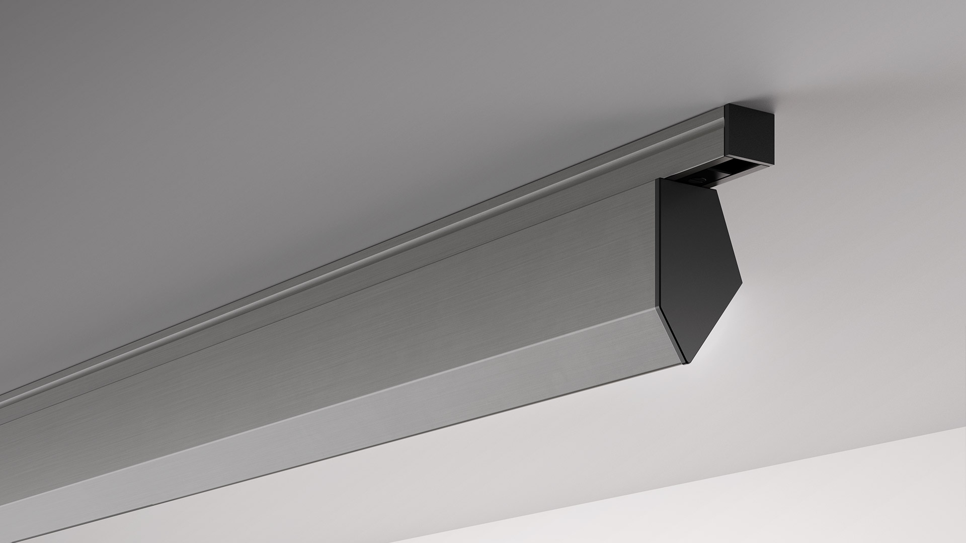 Artemide Decken-Linienleuchte aus gebürstetem Aluminium mit schwarzer Winkelabdeckung, montiert entlang der Wand-Decken-Verbindung.